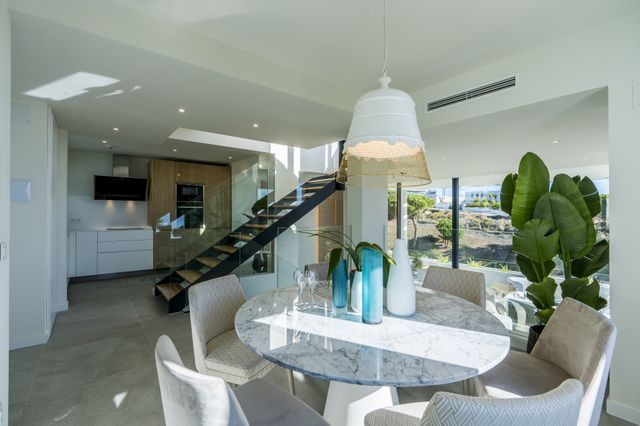Modern townhouses with open sea views in Cabopino Golf - East Marbella 