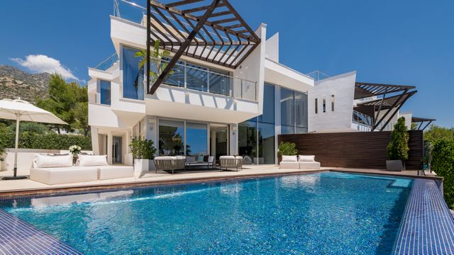 Offbeat semi-detached modern luxury house with panoramic sea views in Sierra Blanca Marbella