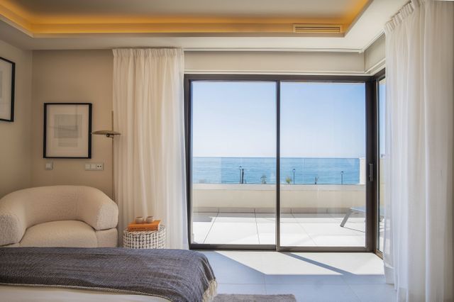 Modern apartments on the first beach line with sea views 